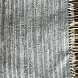 Pelēkas un baltas svītriņas, vilnas auduma grīdceliņš ~70X110cm