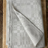 Nekrāsota, dabīgi pelēka toņa lina galdauts dreļļu rakstā, dažādi izmēri